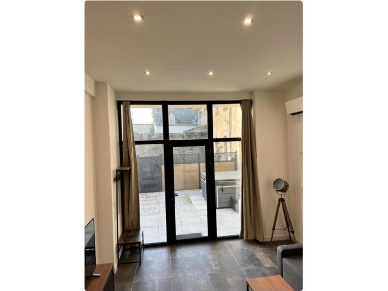 Salon baie vitrée du Loft Jacuzzi